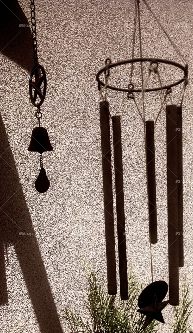 Silhouette Bell And Wind Chime