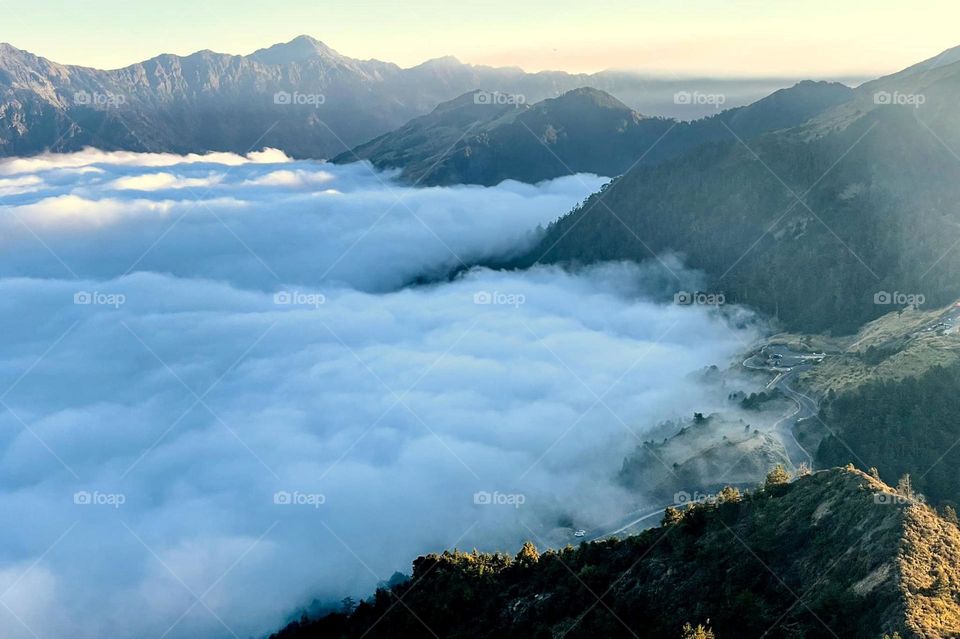 Beautiful natural landscape in the mountains sun rise and sea of clouds in the distance