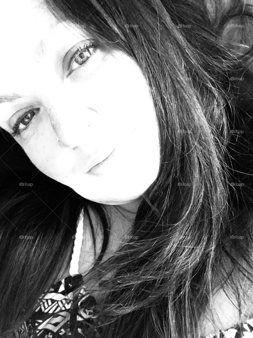 Long dark hair in black and white selfie