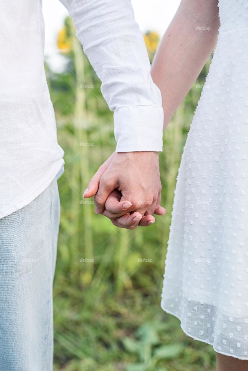 couple holding hands