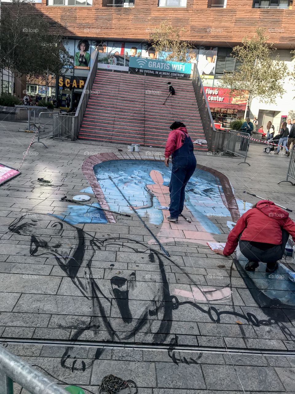 Making 3d art on the pavement in the city