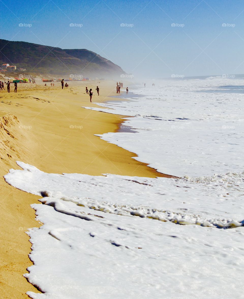 People enjoying at beach