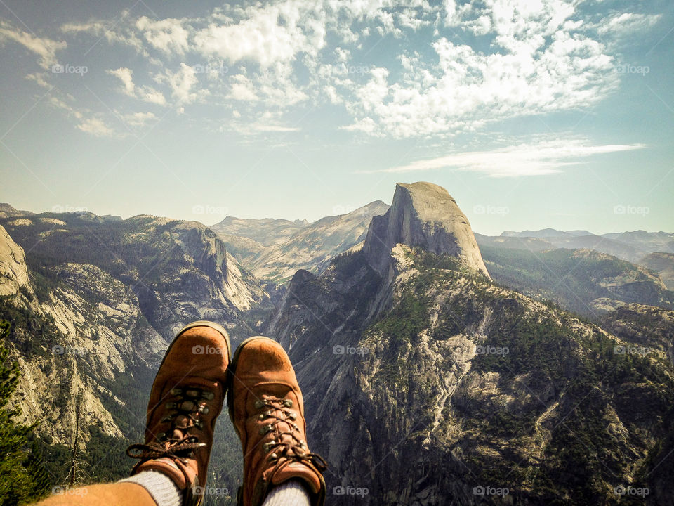 Hiking boots pointed out to half dome in Yosemite national park 