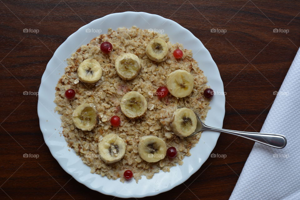 High angle view of oatmeal with fruits