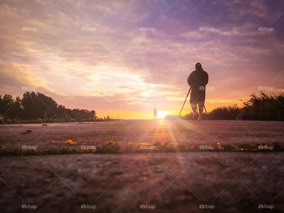 photographer photographing the sunrise.