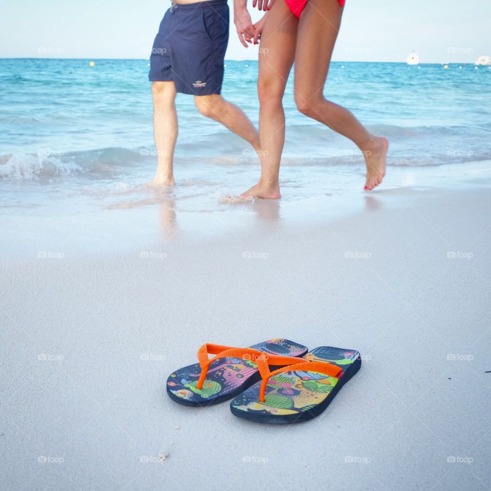 people walking at the beach