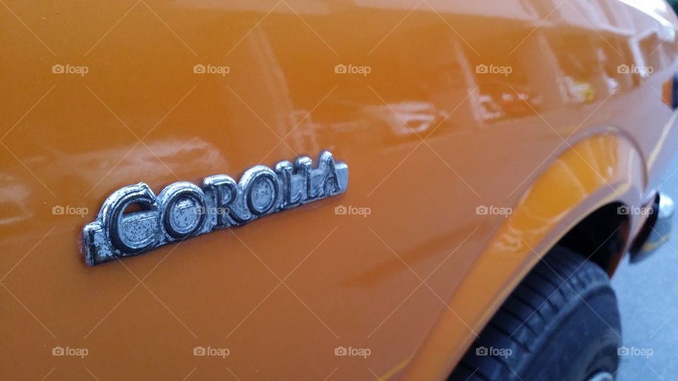 Orange Toyota Corolla Asia