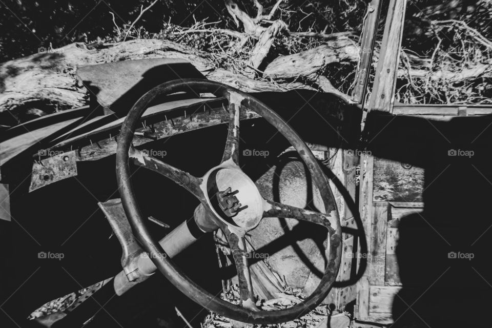 a old model t car abandoned in the desert