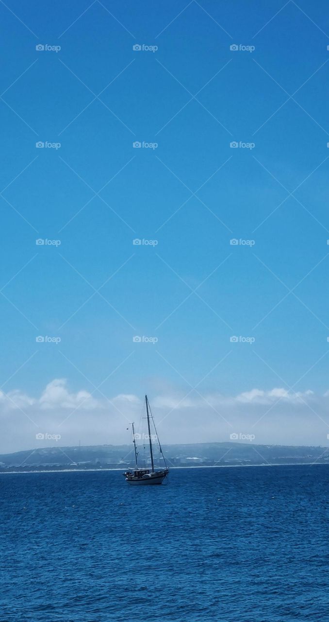 a yacht anchored in the bay.