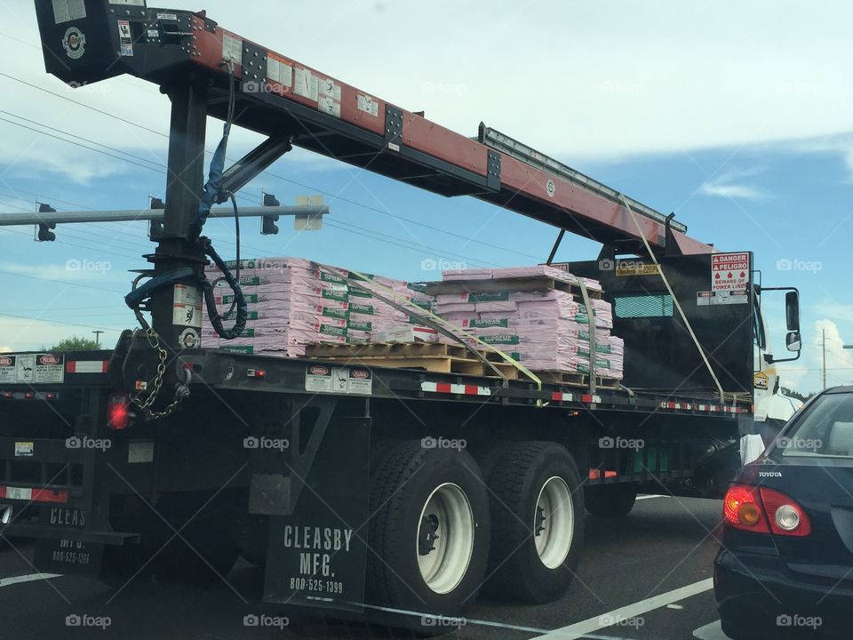Pink Cargo on a semi truck. Pink cargo loaded on top of a semi truck 