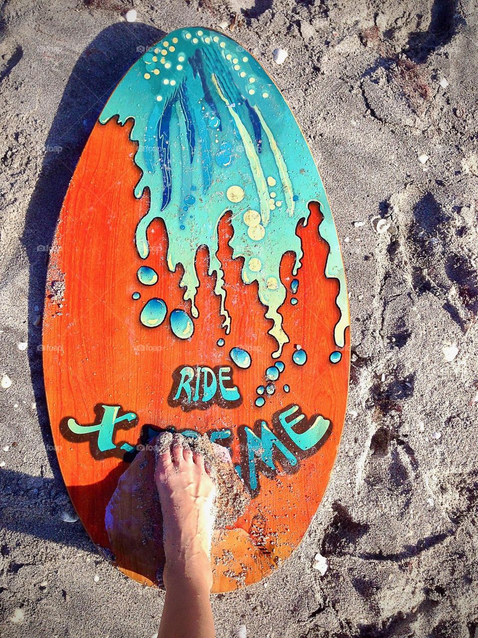 Surfboard on the beach.