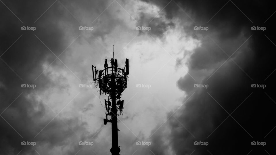 Communication tower in stormy day