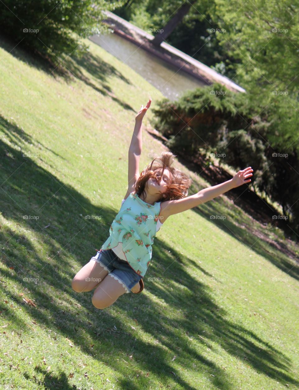 Young Girl Jumping for Joy