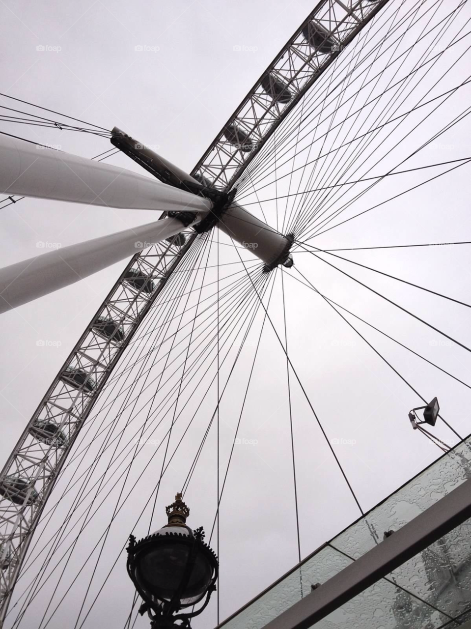 london london eye wheel clouds by stuarto
