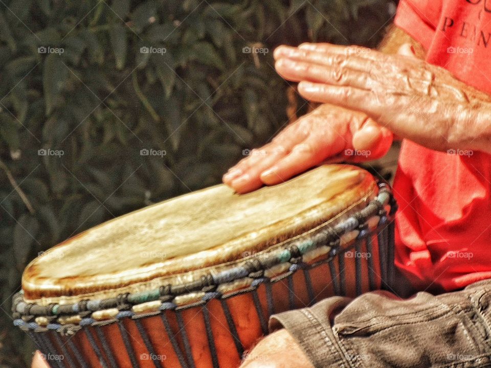 Playing Bongo Drums