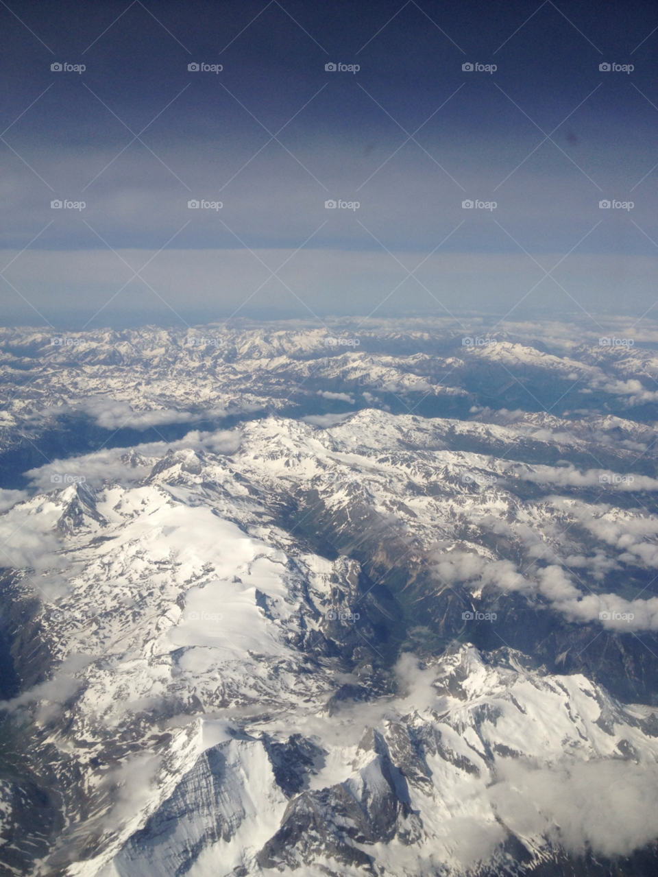 Birds eye mountain view. The Alps from an aeroplane 