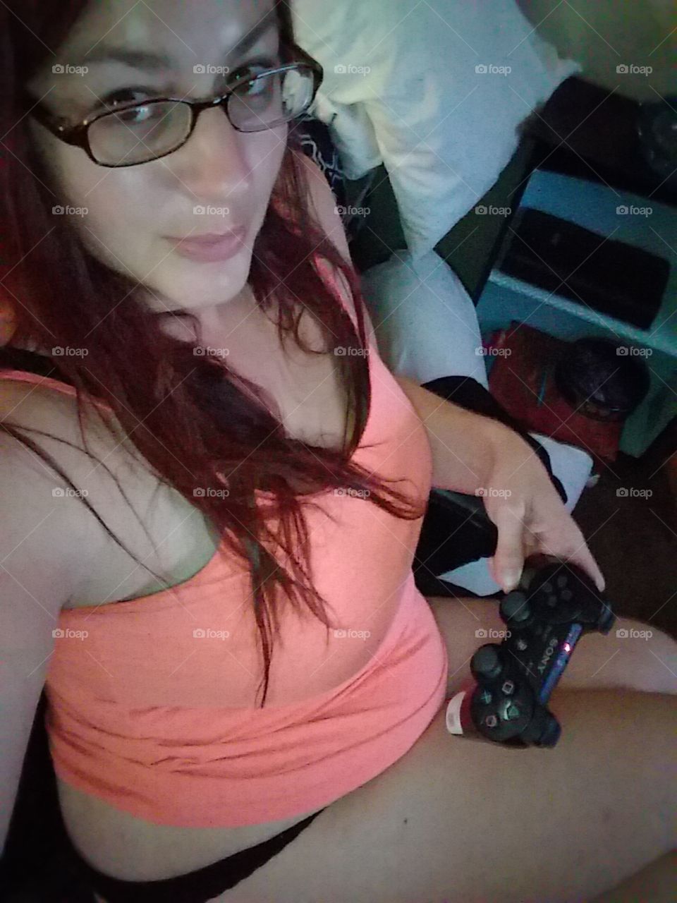 Sexy gamer girl in nerdy glasses