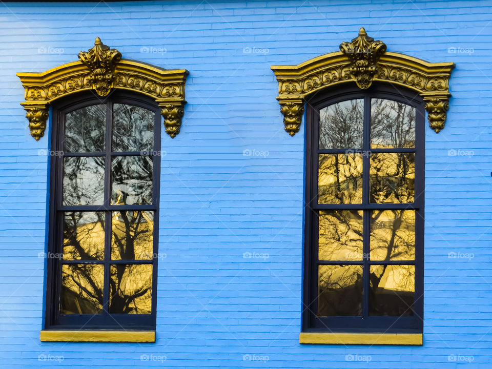 Sunset Through Victorian Building Windows