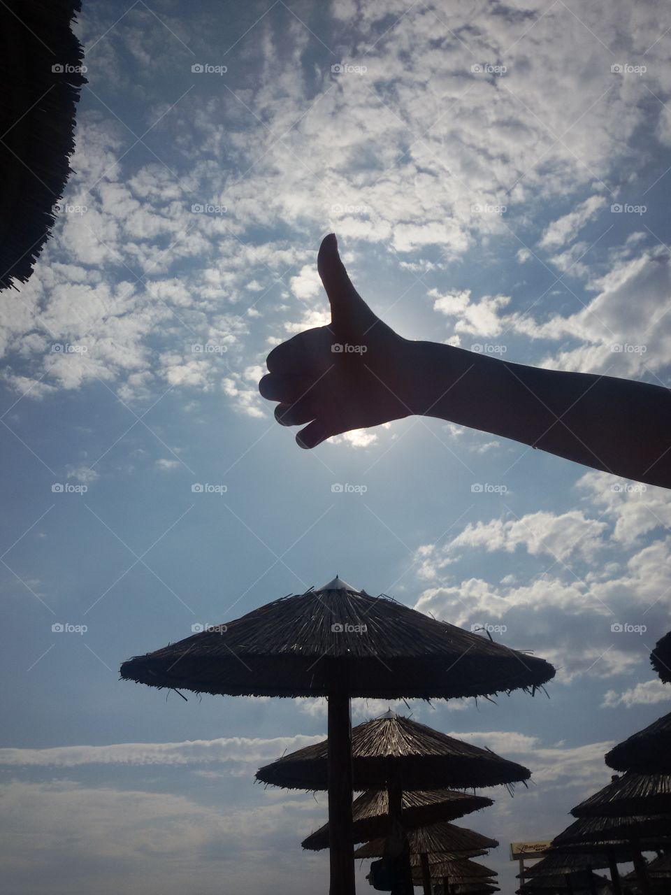 Thumbs up on the beach