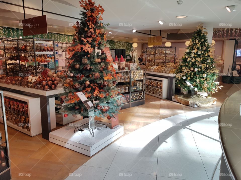 Christmas trees and decorations at Christmas shop at Peter Jones Sloane square Chelsea King's road London