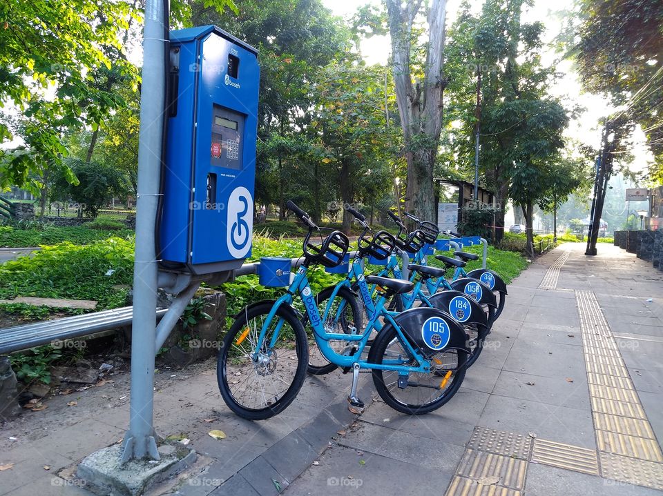 Public bicycles parking on the pavement