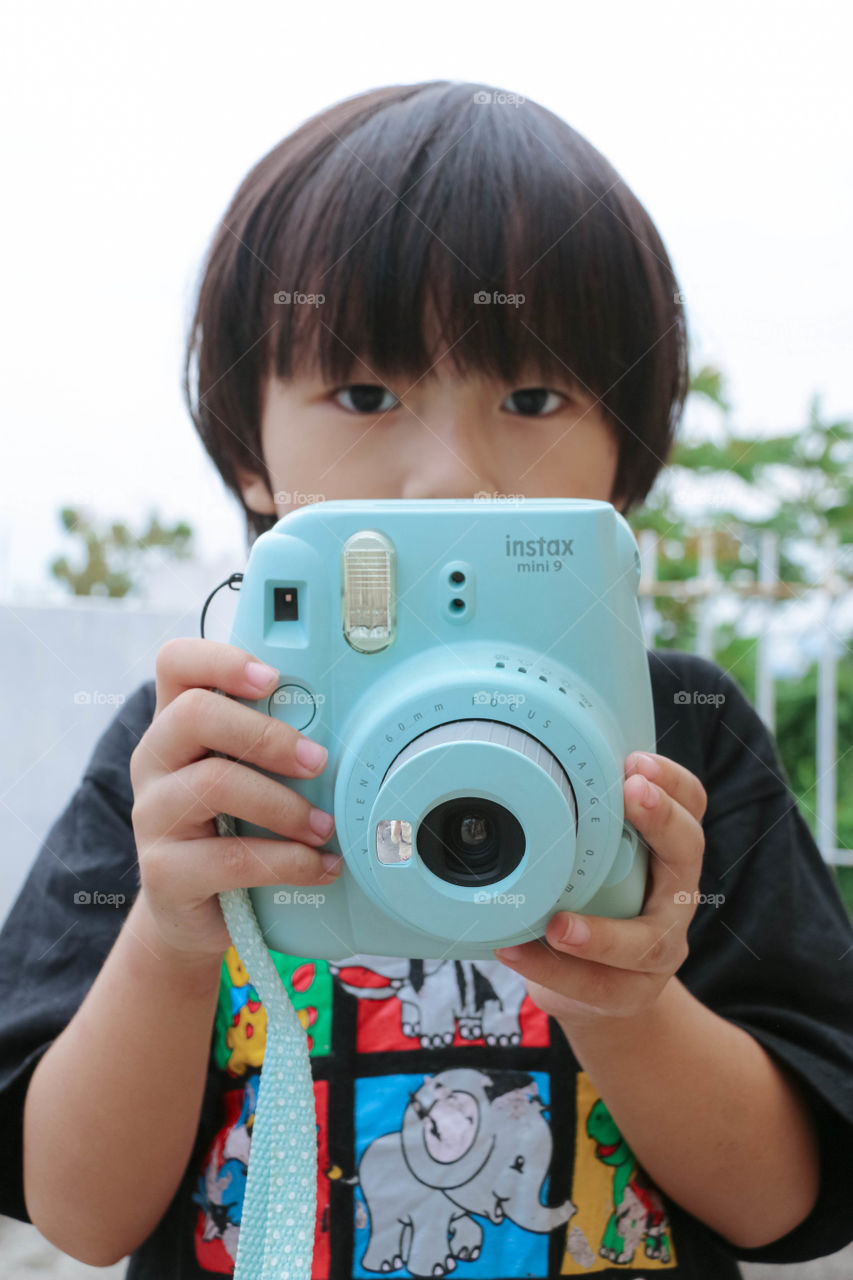 when kids hobby is a photography and only instax his favorite camera