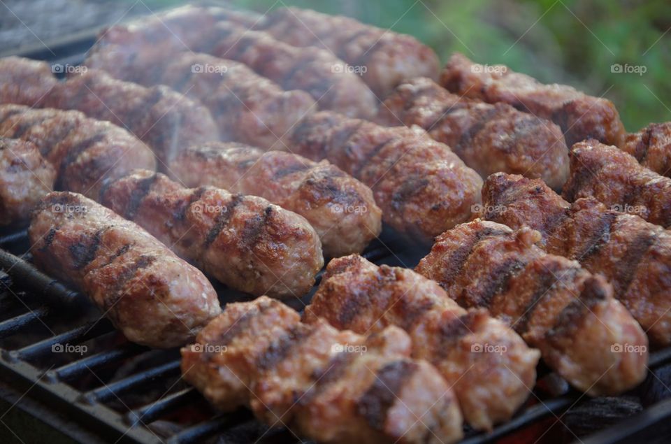 Romanian traditional barbecue with mici or mititei