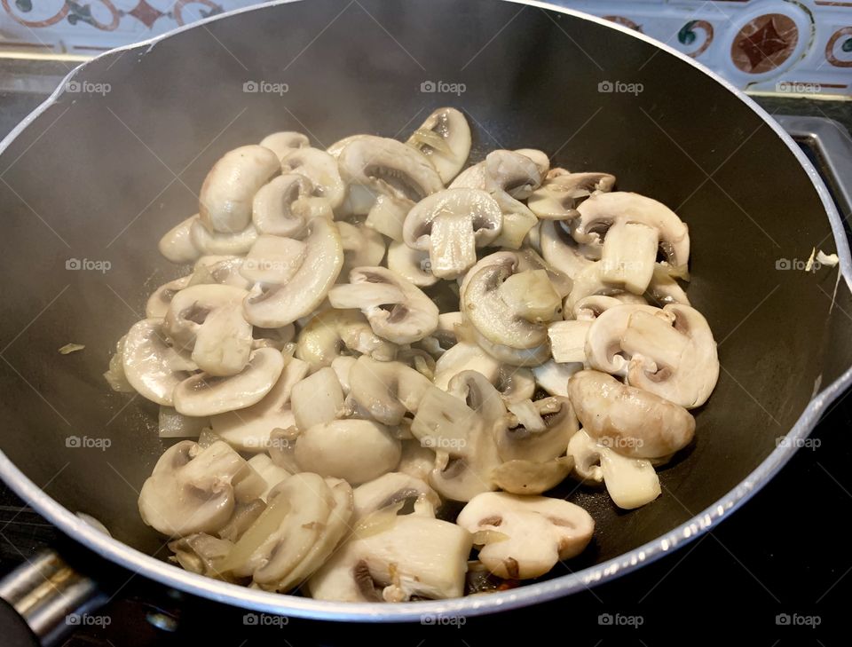 Champion mushroom stirred fried were on progress for side dishes 