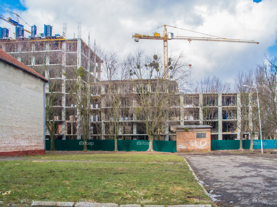 building process with crane on long exposure