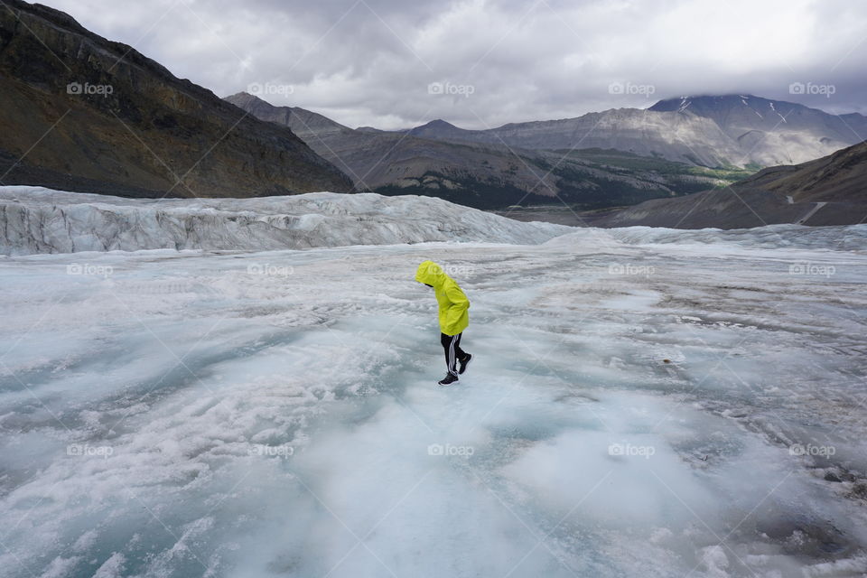 Our Nature … child standing on a glacier 