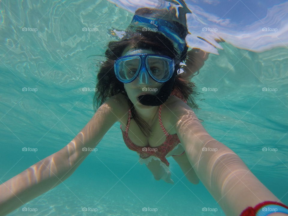 girl taking underwater selfie, Thailand