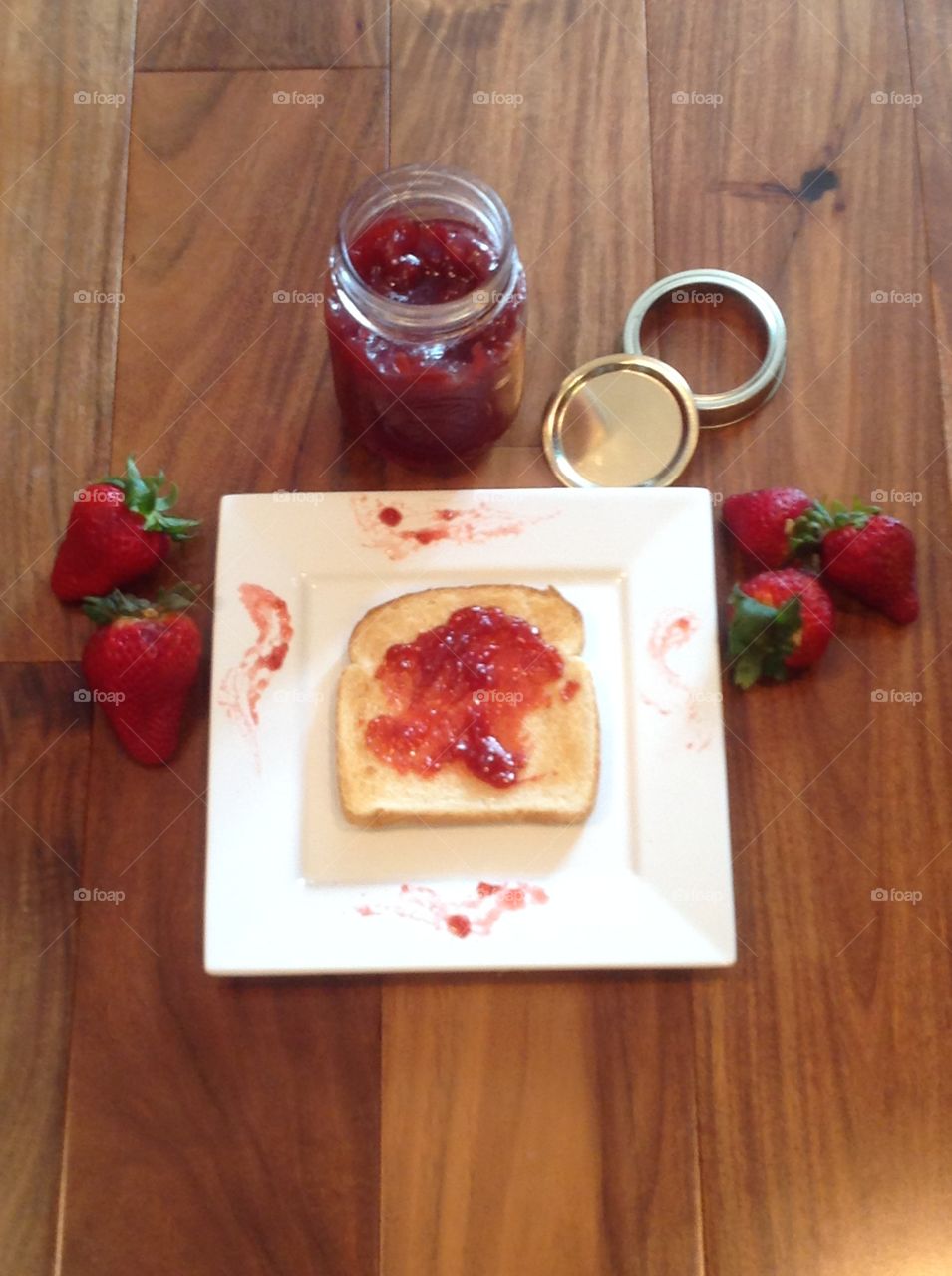 High angle view of homemade strawberry jam