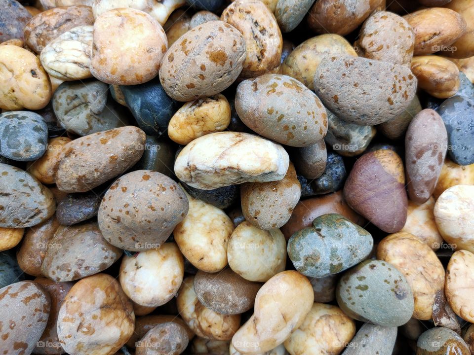Many color stones, many sizes, used to decorate the garden.