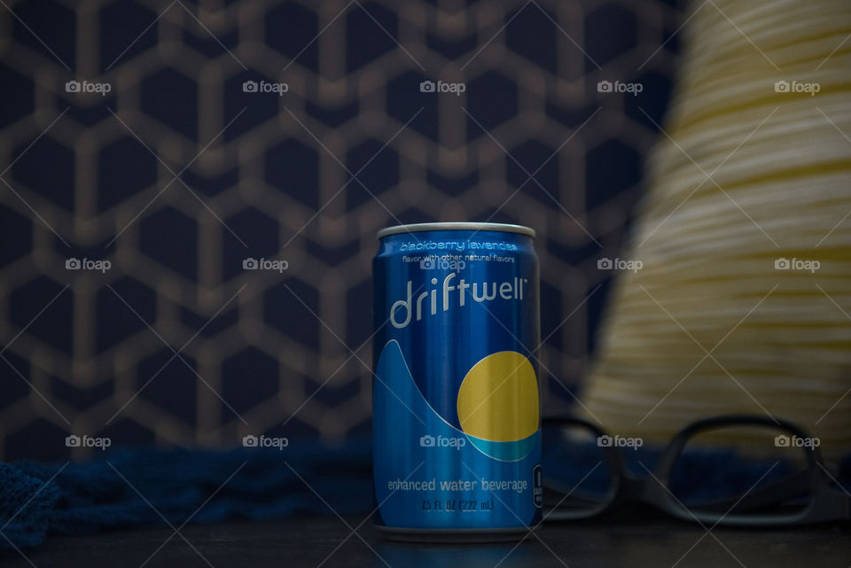 Can of Driftwell on a table