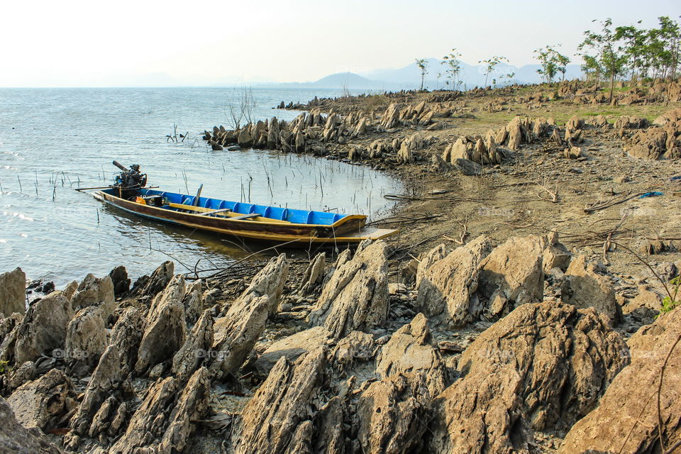 Wooden boat at the lake