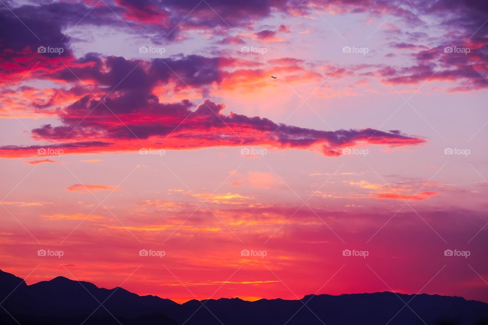 Magnificent violet and pink twilight masterfully painting the Las Vegas Valley.