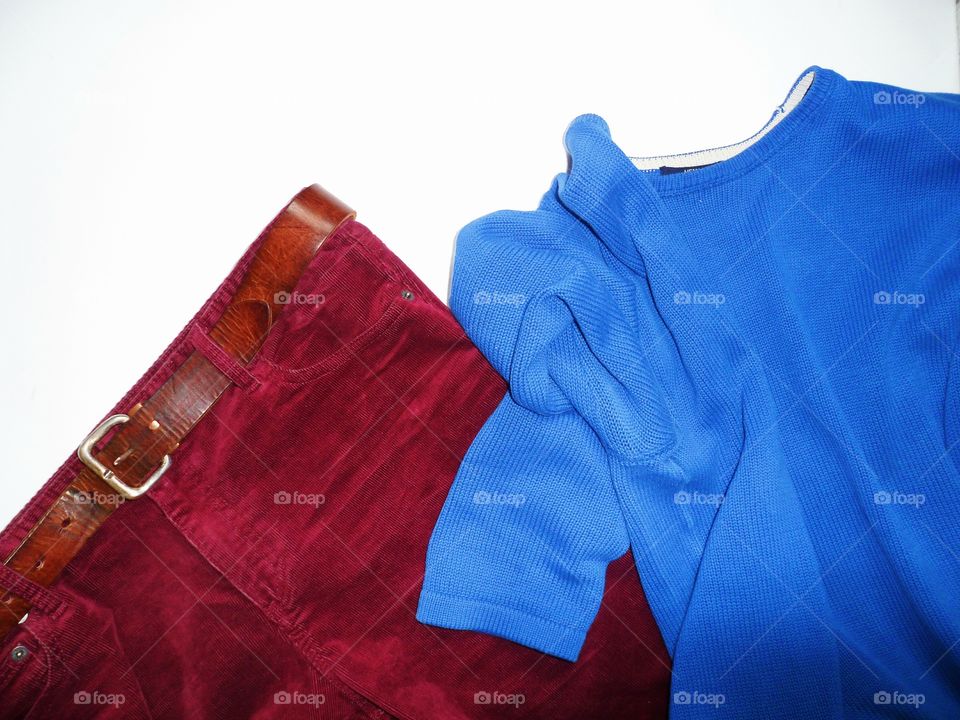 Velvet maroon pants and blue men's sweater