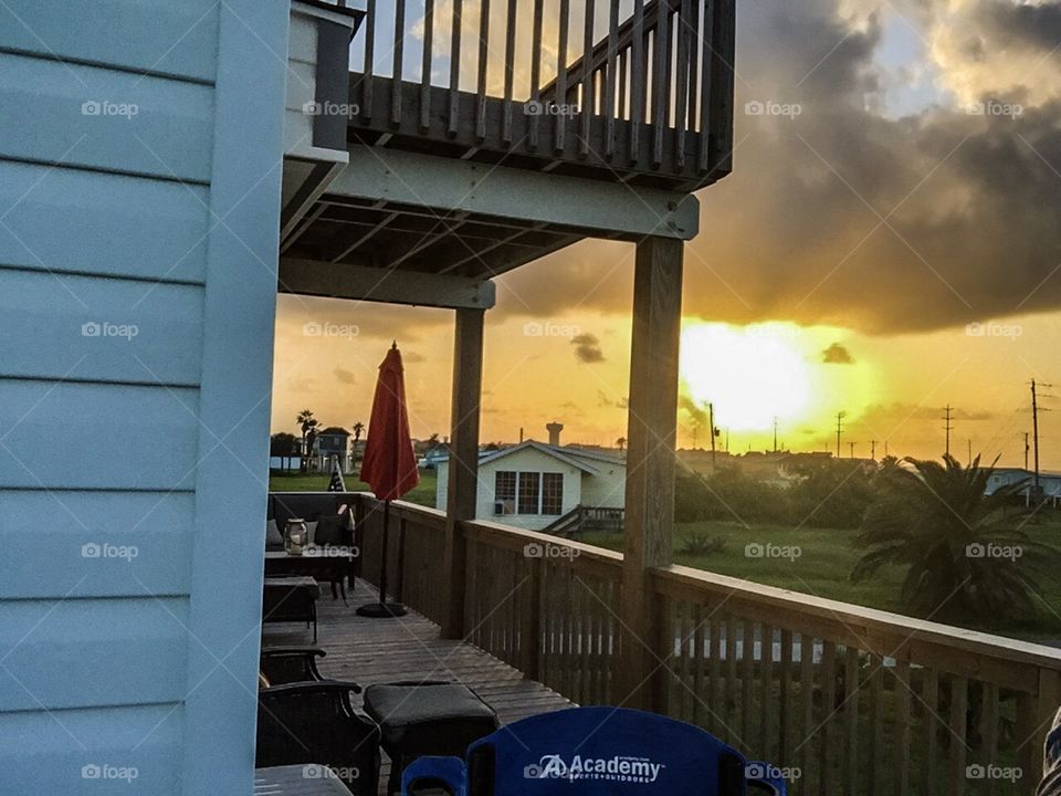 Porch view . Sunrise on the porch Galveston Texas 