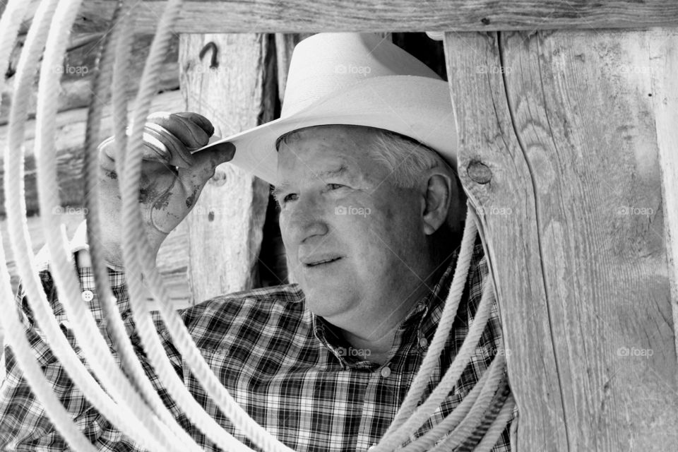 Close-up of old man with cap