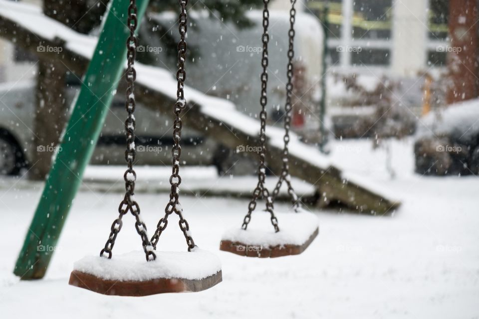 Swings during snowfall