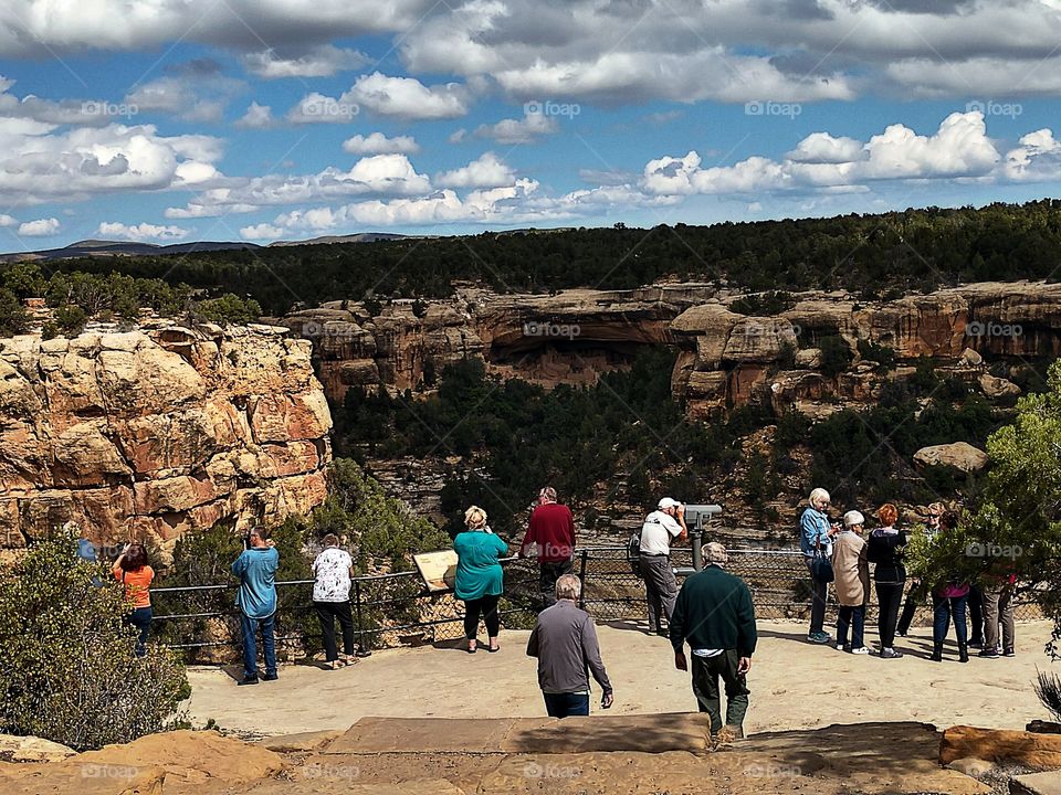 Tourists looking at Cliff Palace, Mesa Verde National Park