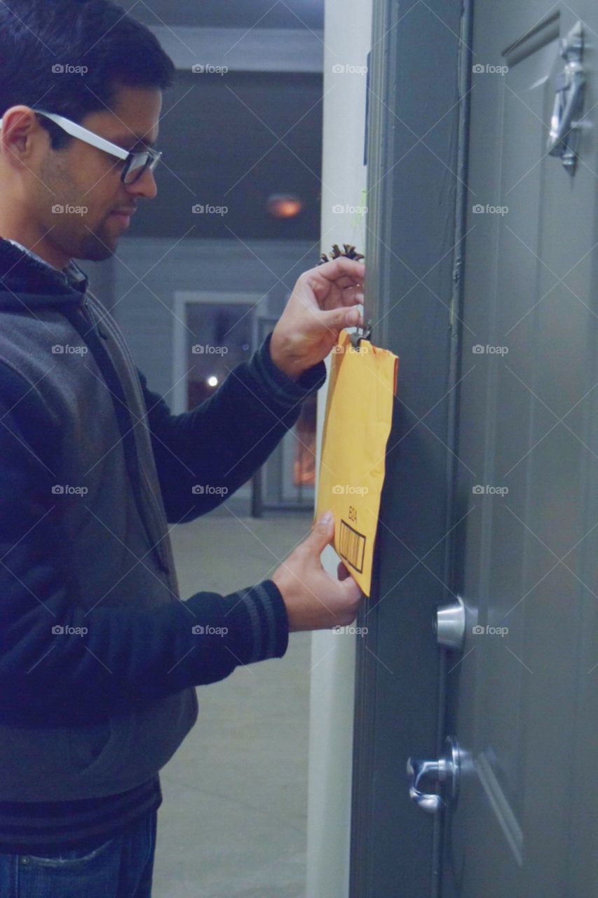 Man picking up mail