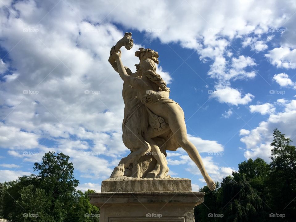 A statue of two in Lazienki Krolewski park