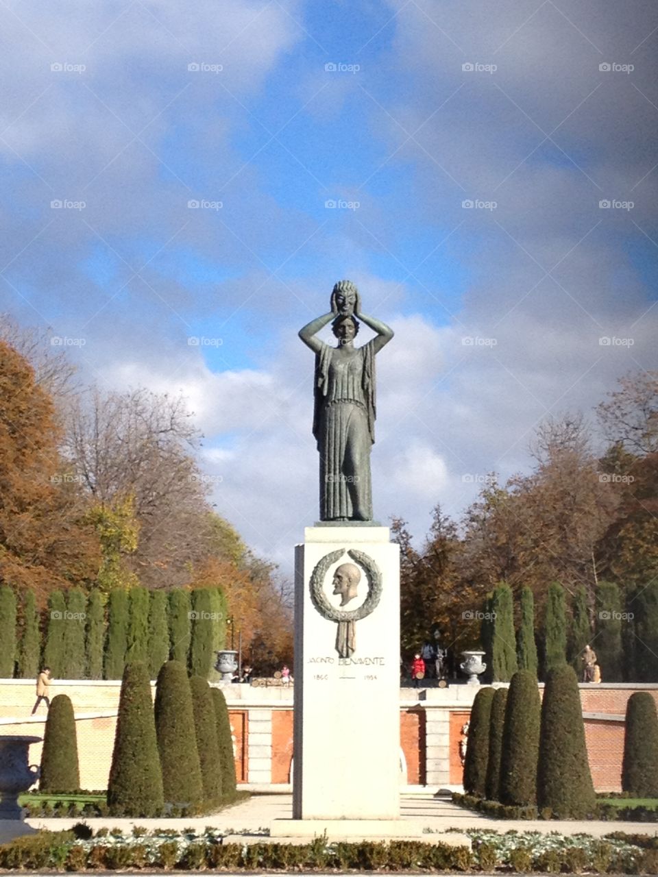 Park Statue. Madrid Buen Retiro park monument art sculpture trees stone 1500s architecture historic beauty outdoors 