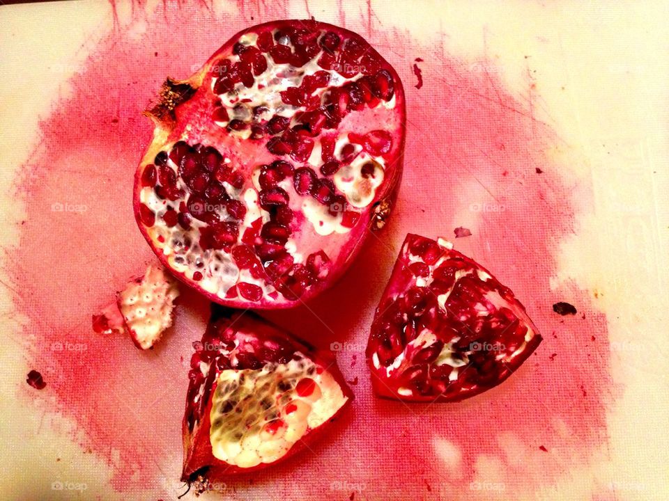 Pomegranate on cutting board