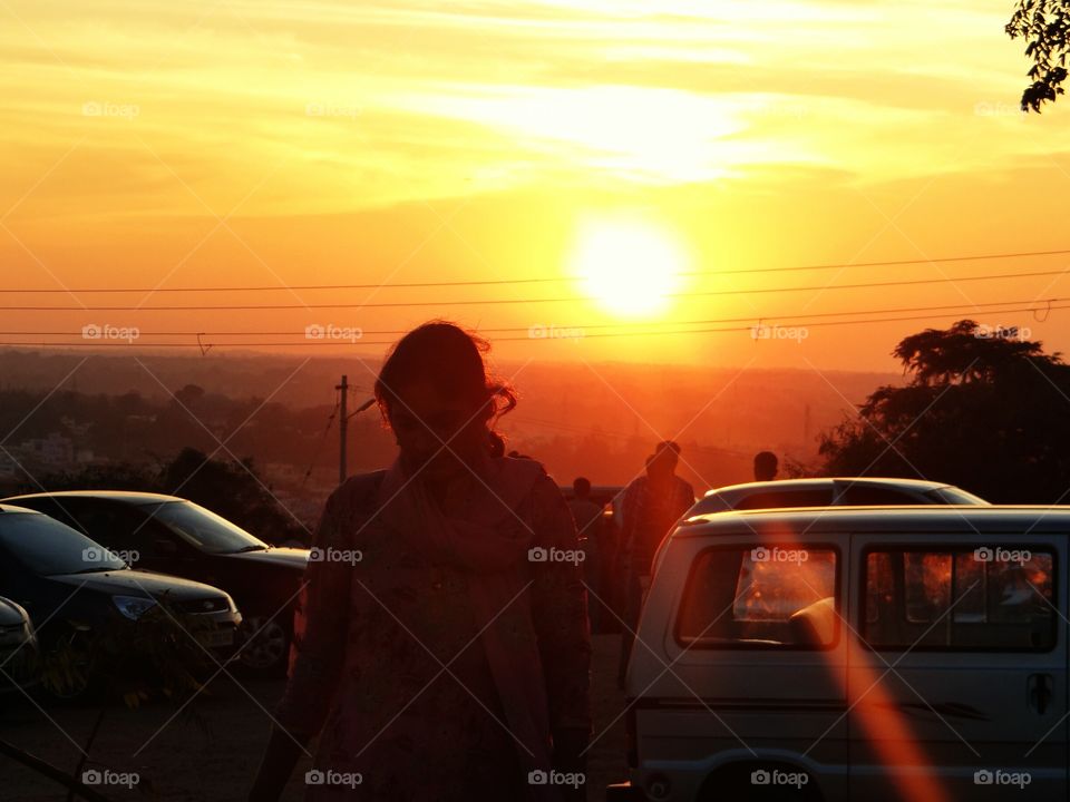 Sunset on a busy street