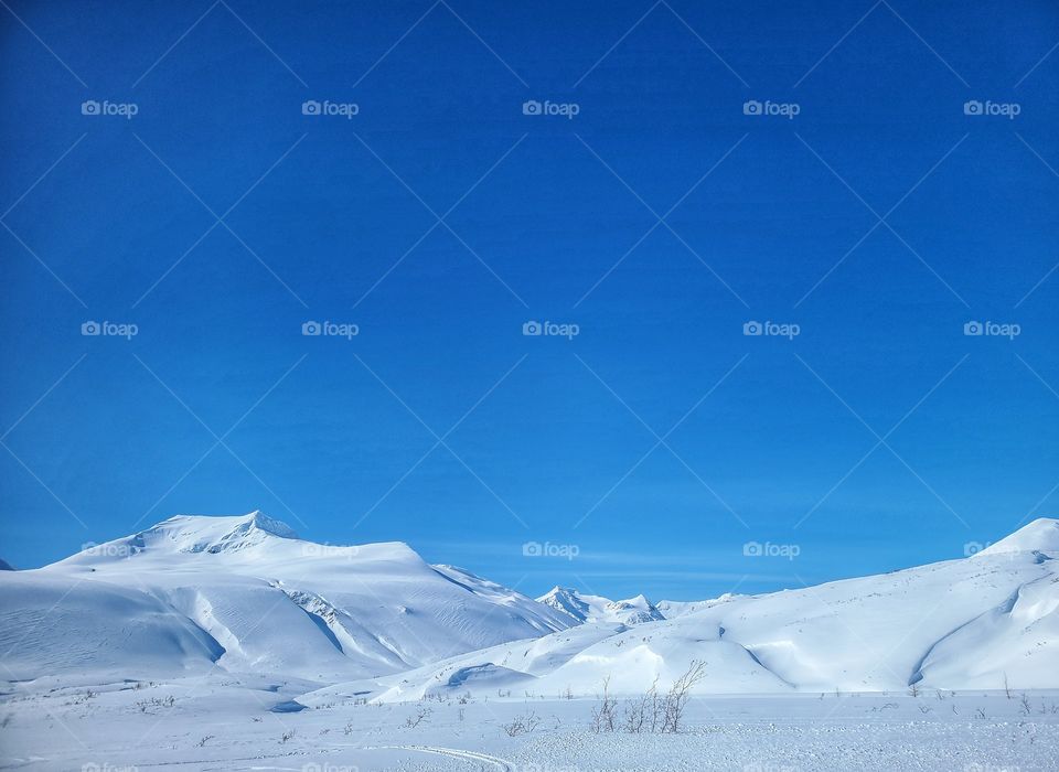 Snow white mountain tops