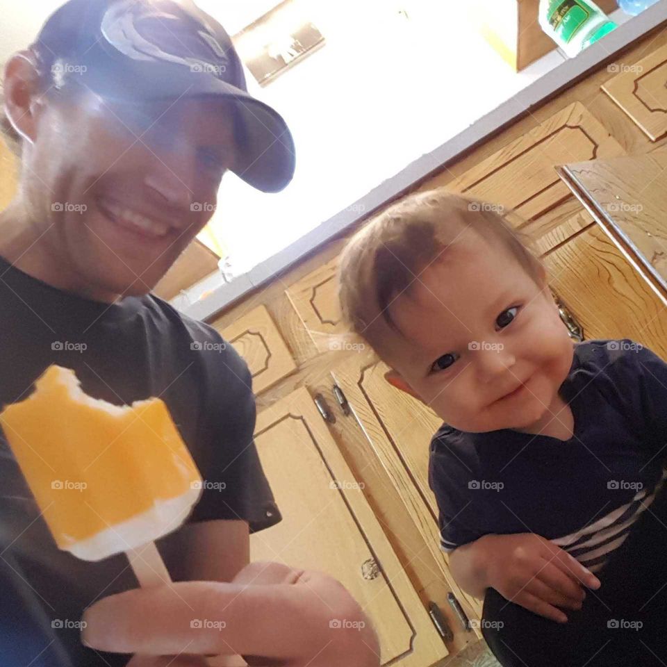 Father and son taking a break from our popsicles for a son & dad selfie