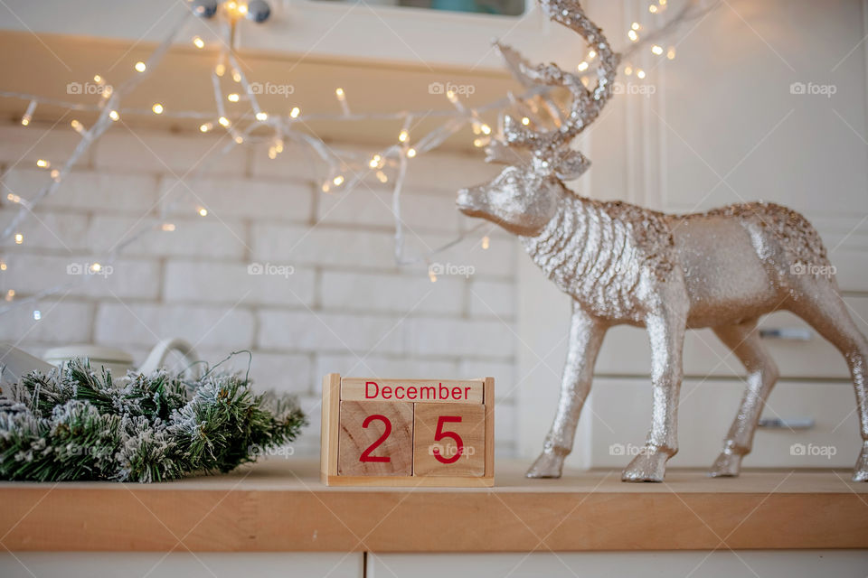 Christmas background with wooden block calendar with the date of December 25