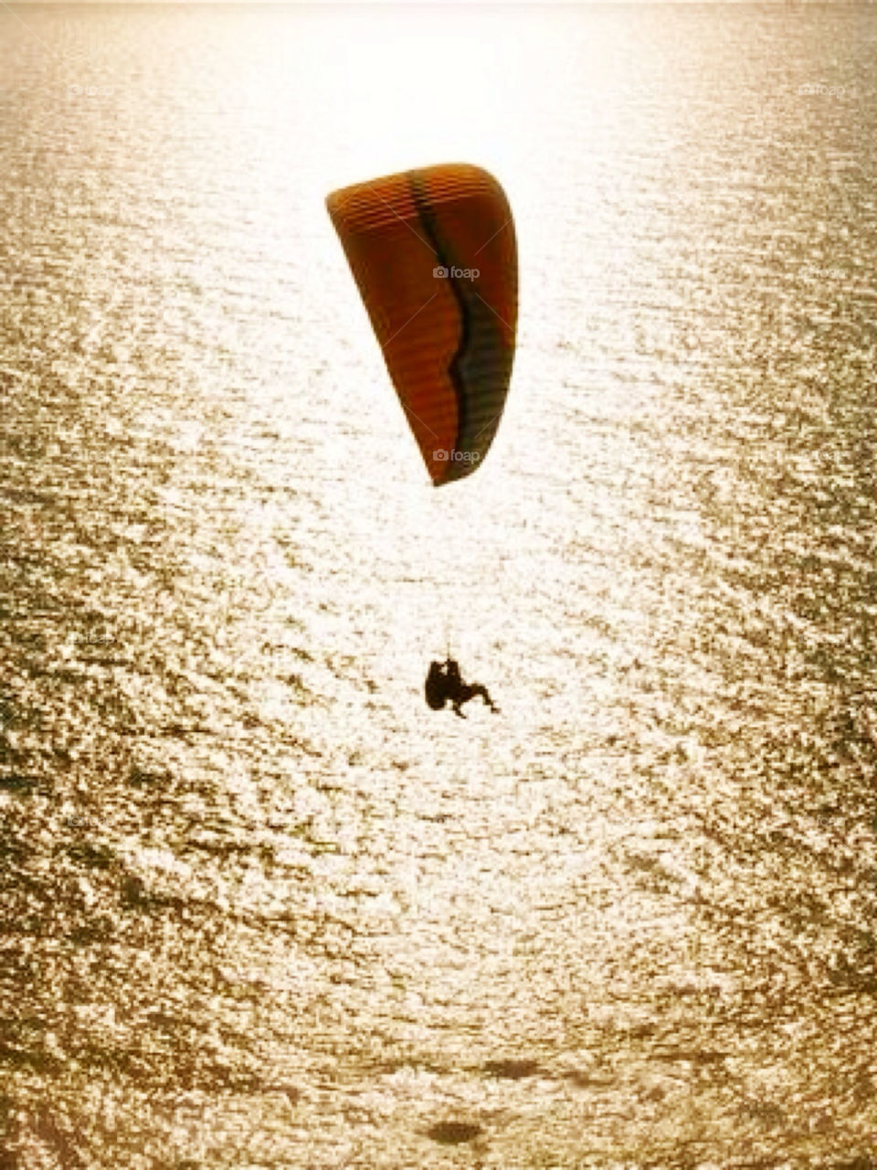 Paragliding above the sea